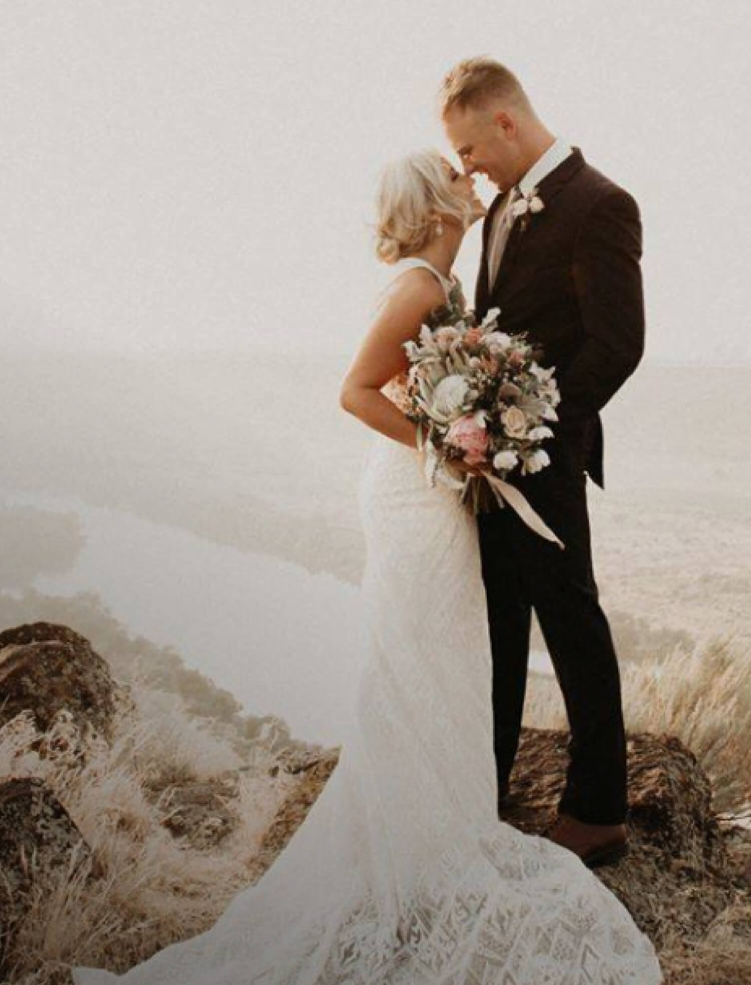 Plus size model in white Sophia Tolli dress