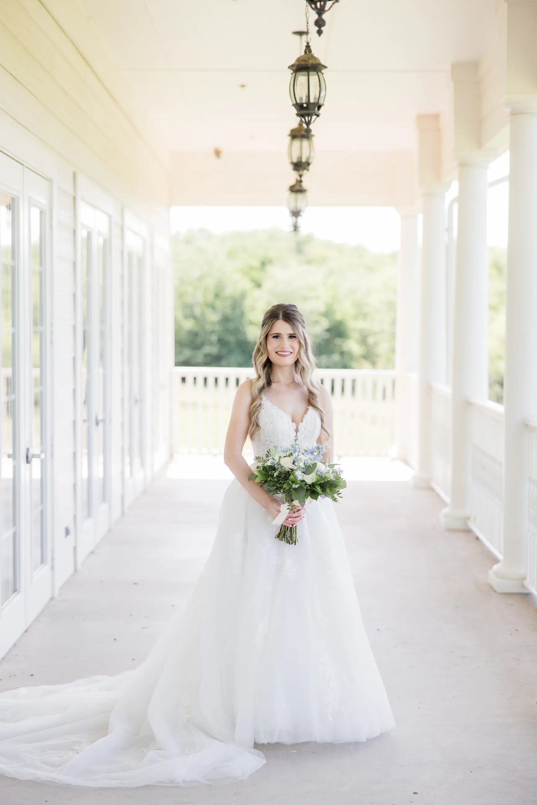 image shows a bride wearing a sophia tolli wedding dress
