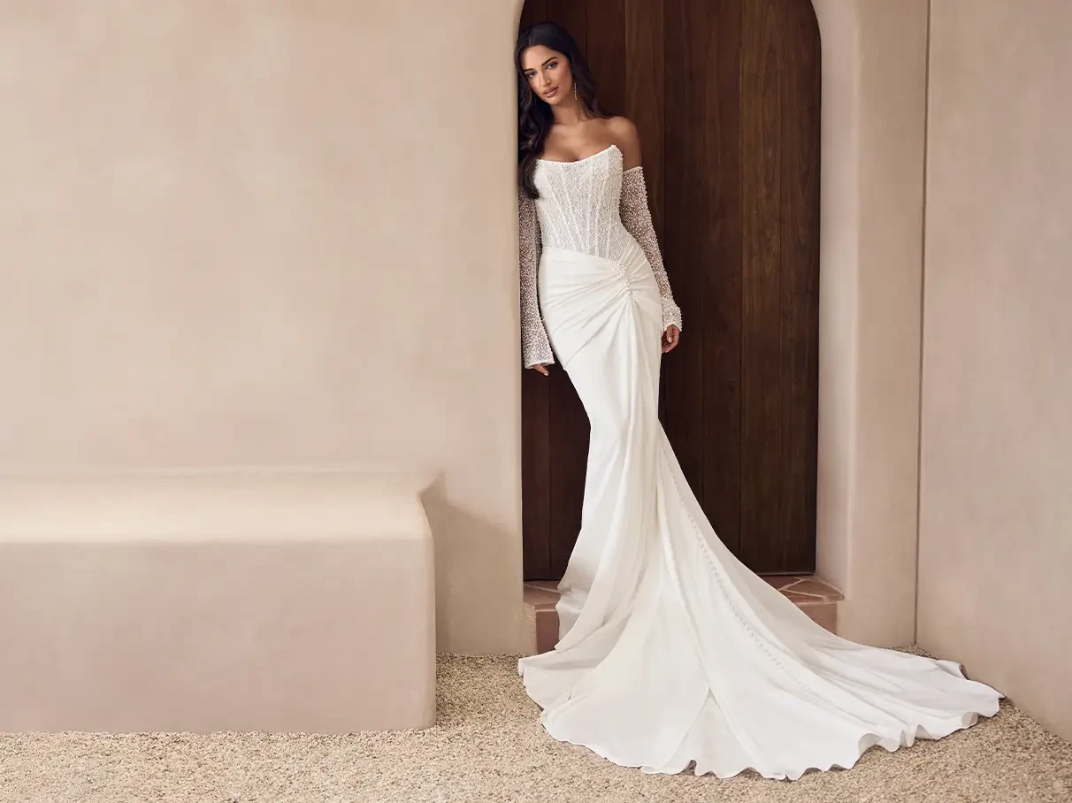 Model in wedding dress by Sophia Tolli
