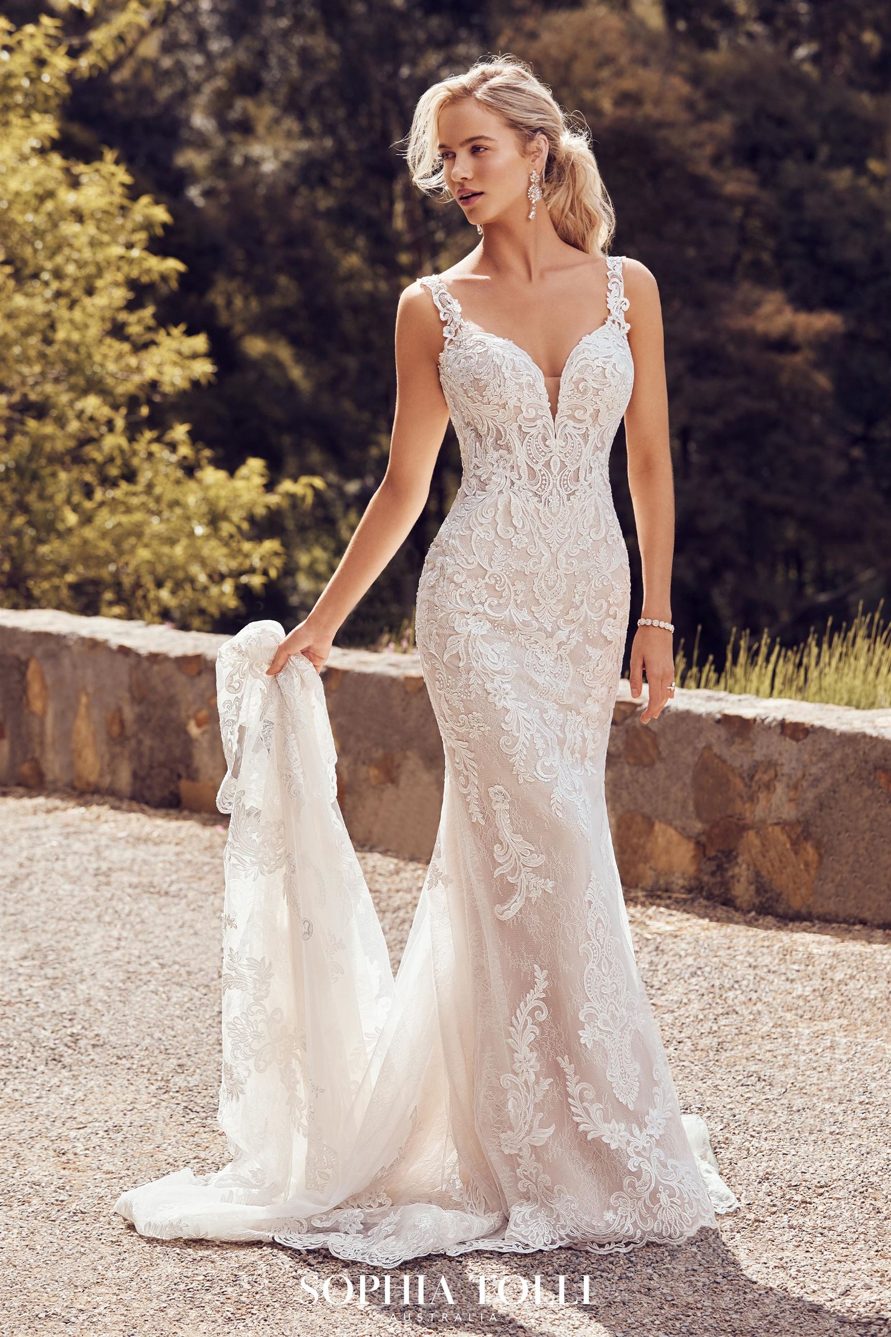 wearing two wedding dresses