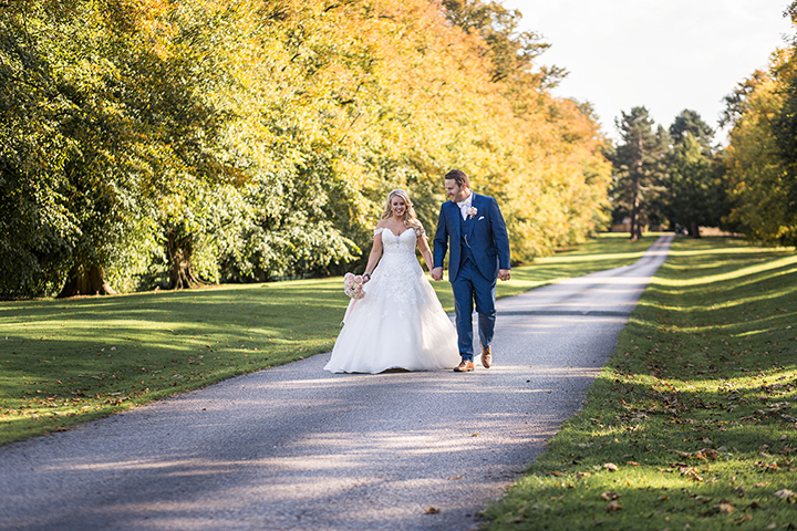 September Bride Personalized Her Gown With Drop Lace Sleeves