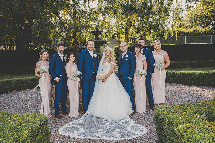 September Bride Personalized Her Gown With Drop Lace Sleeves