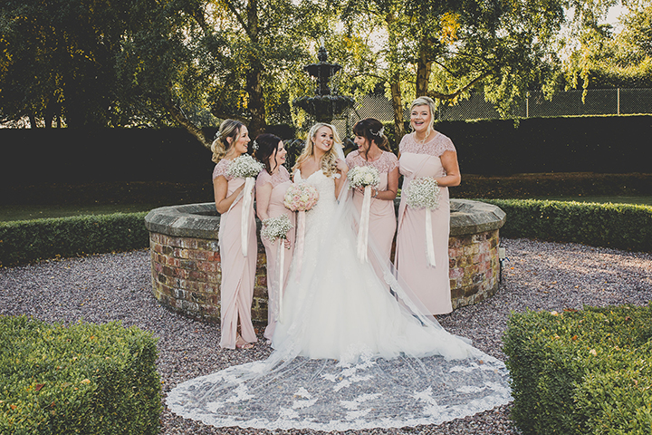 September Bride Personalized Her Gown With Drop Lace Sleeves