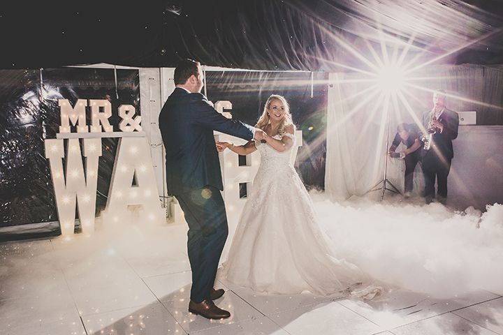September Bride Personalized Her Gown With Drop Lace Sleeves