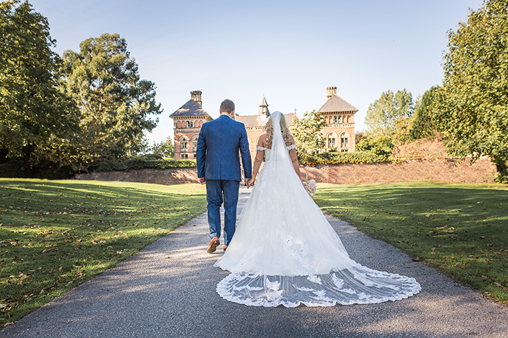 September Bride Personalized Her Gown With Drop Lace Sleeves