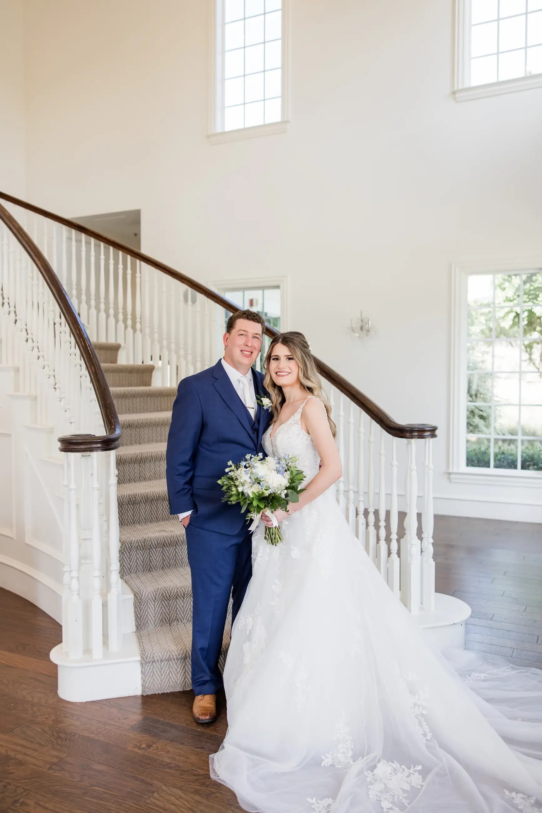 image is showing a husband and wife smiling on their wedding day